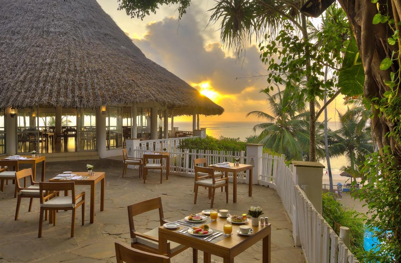 Diamonds Leisure Beach & Golf Resort Diani Beach Bagian luar foto Sunset at the Beach Club