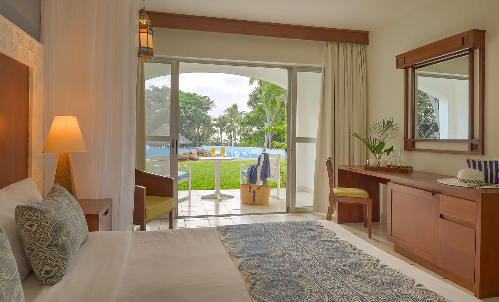 Diamonds Leisure Beach & Golf Resort Diani Beach Bagian luar foto A room at the resort